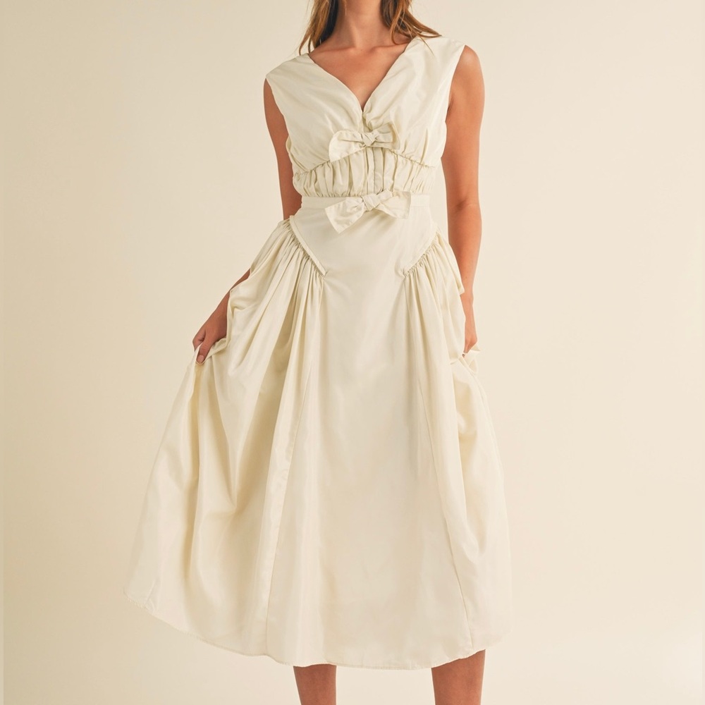 Chic Cream Midi Dress with Bow Accents